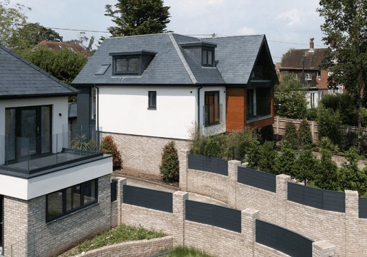 DuraPost PRIMA® slotted into concrete walls in a housing development