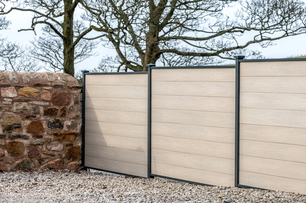 DuraPost VISTA® in oyster next to a stone wall